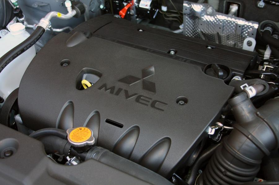  Mitsubishi Outlander Sport 2011 года  (фото 30 из 49)